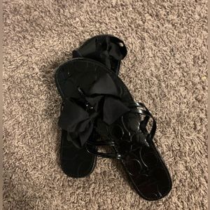 Black coach flipflop/sandals.